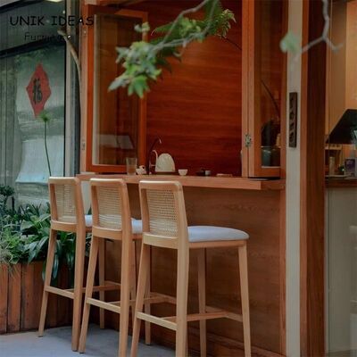 Bon prix Nordic Modern Coffee Shop Front Counter High bar Stool Garden Courtyard Creative Solid Wood Hand Made Rattan bar Chair en ligne