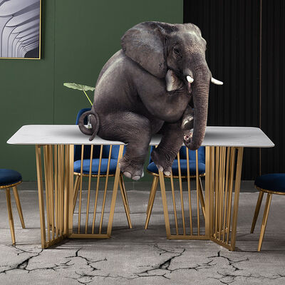 Bon prix Table de salle à manger de luxe et chaises d'effet de marbre blanches avec la jambe UK-KD006 d'acier inoxydable en ligne